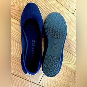 Rothy’s flats, size 10, navy blue with stripe on back